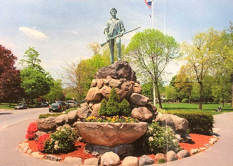 1900 Statue of The Minuteman, Historic Battle Green, Lexington, Massachusetts. A stylized depiction of Capt. John Parker of the Lexington Militia.