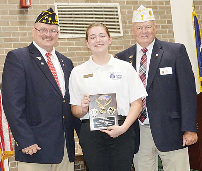 Law Cadet Victoria Barden was presented the Randal Ford Academic Award/Giving Back to the Community by American Legion Dept. of South Carolina Commander John H. Britt as Laurens Post 25 member Russ Cantrell observes.