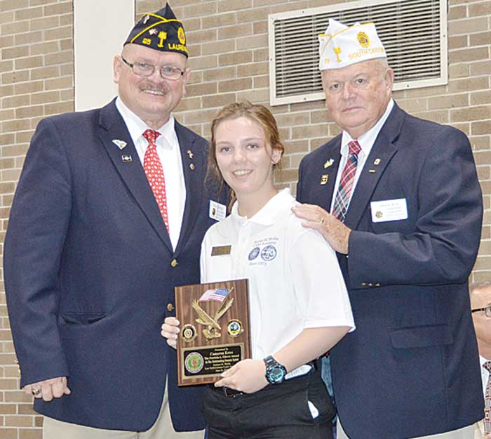 Law Cadet Cameron Estes was presented the Patricia A. Glover Award as the Outstanding Female Cadet by American Legion Dept. of South Carolina Commander John H. Britt as Laurens Post 25 member Russ Cantrell looks on.
