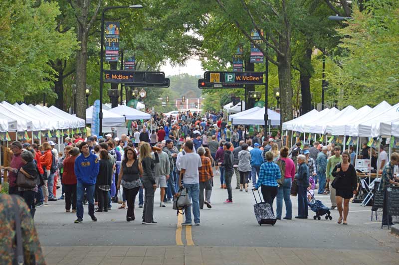 Another busy day for Main Street Downtown Greenville, SC. - Photo by Tony Dunn