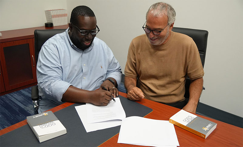 Prison Fellowship Internationals Frank Lofaro and Bible League Internationals Jonathan Adams Sign Partner Agreement