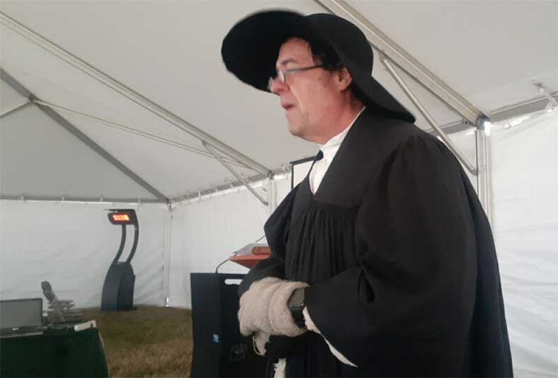 Robert Ryals performs as the Reverend William Martin
