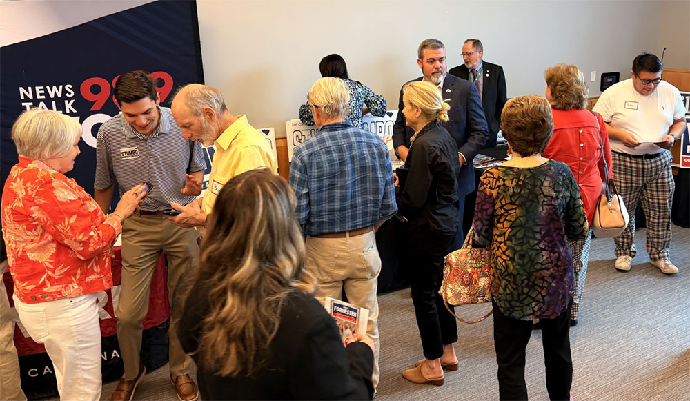 Solicitor David Stumbo speaks with attendees during the “Get Connected!” grassroots voter engagement event in Greenville as his campaign for South Carolina Attorney General meets voters one-on-one.