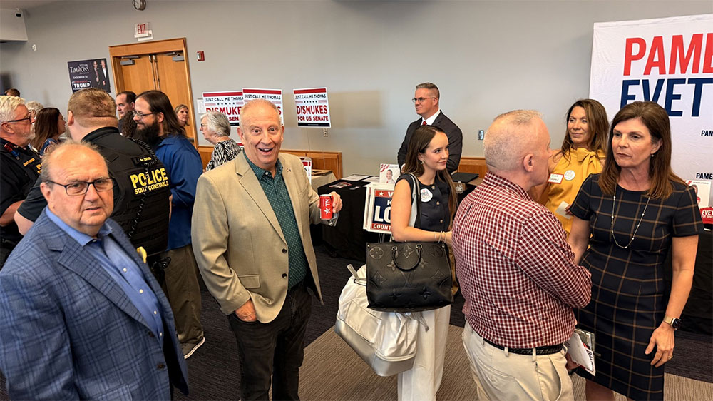 98.9 WORD radio personalities Mike Gallagher and Joey Hudson mingle with attendees as Lt. Gov. Pamela Evette speaks with voters during the “Get Connected!” grassroots candidate event in Greenville.