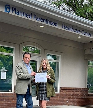 Congressman Fulcher and Brandi Swindell standing in front of the former Boise Planned Parenthood.