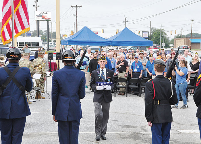 Post 214 Commander Tony Dunn delivered Flag flown over US Capitol to be raised on new flag pole.