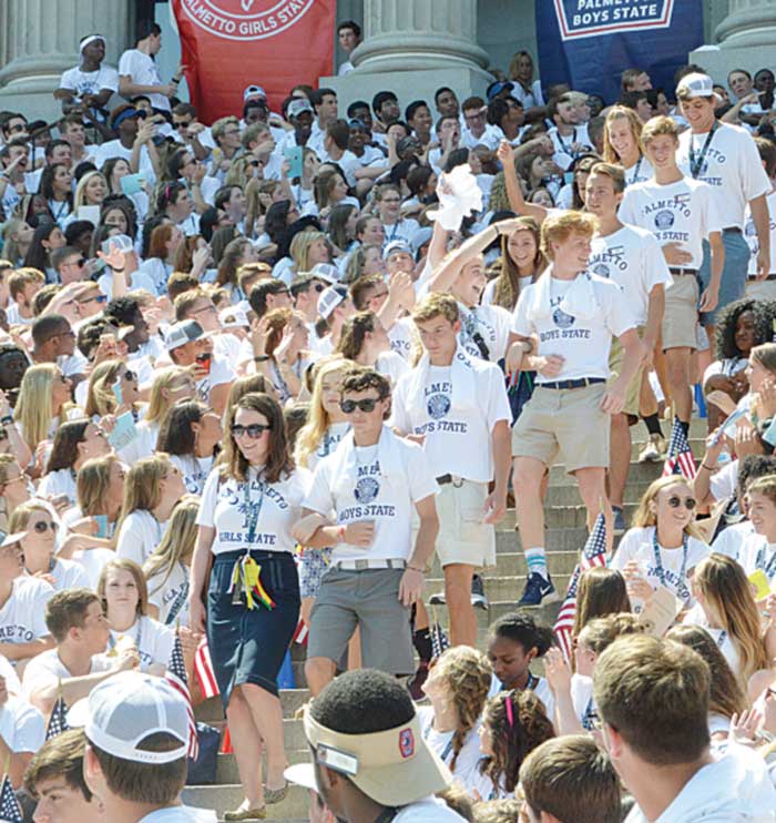 Palmetto Boys and Girls State citizens,  who were duly elected to the SC House  of Representatives, walk down the  State Capitol steps.