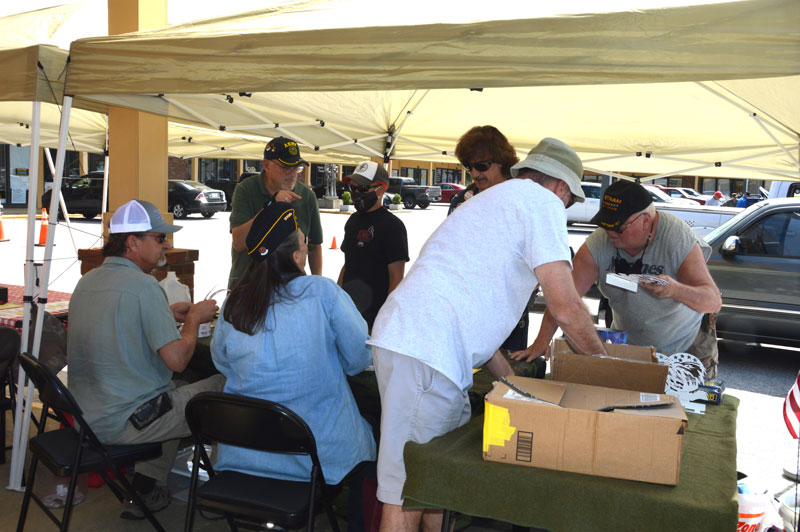 Members of Post 214 prepare for Car Show. Members of Post 214 prepare for Car Show.