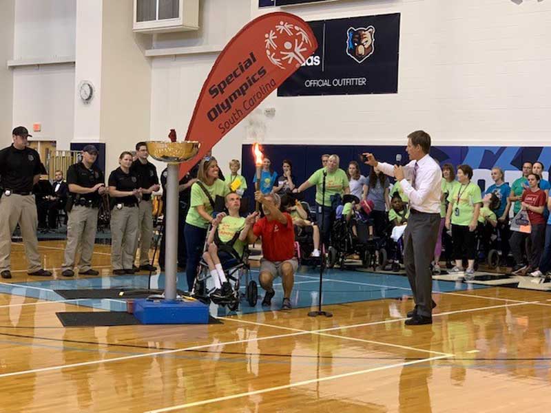 Washington Center students participate in the opening ceremonies of the 2018 Special Olympic Challenge Day on the Bob Jones University campus.