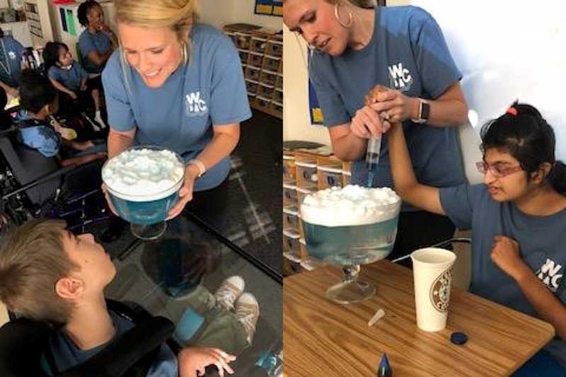 Washington Center students Janhavi Math and David Ugrimov assist in creating rain clouds. The students enjoyed seeing the cause and effect of clouds producing rain through the science experiment.